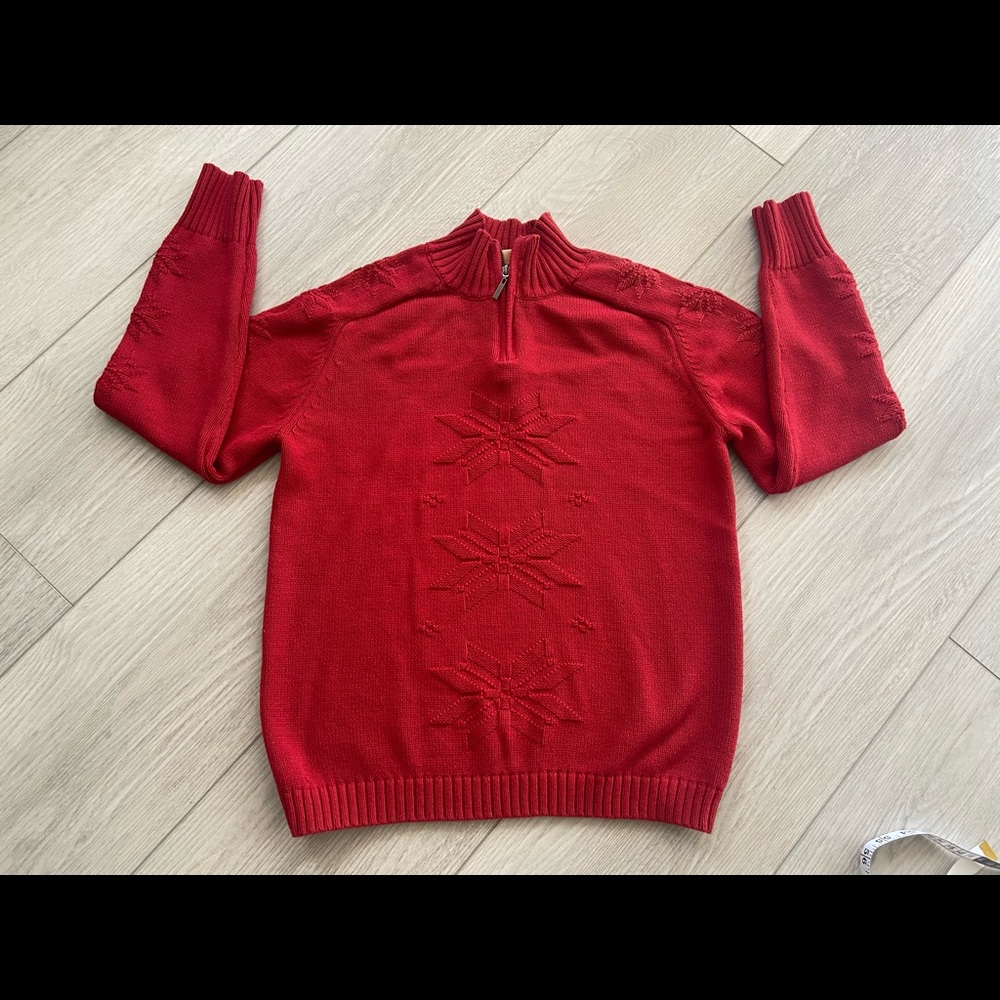 Boy’s red holiday sweater